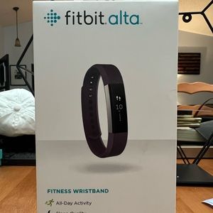 Purple Fitbit Alta. Used for a few weeks then stuck with my Apple Watch.